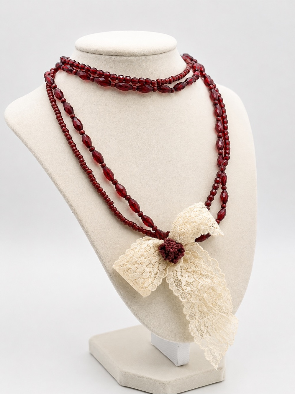Red Multi-Strand Beaded Necklace with Cream Lace Bow